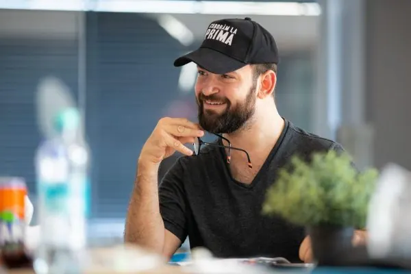 Tedy Necula smiling on set